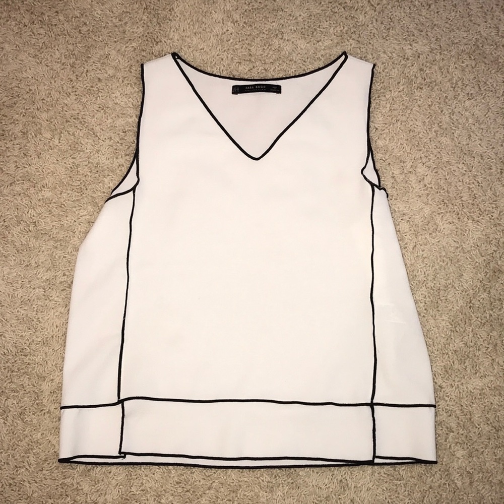white sleeveless blouse